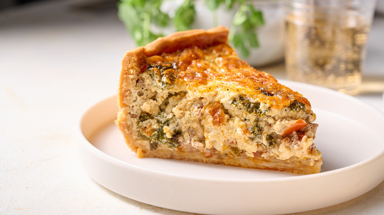 slice of quiche on plate