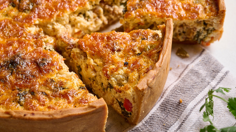 slice of quiche on table