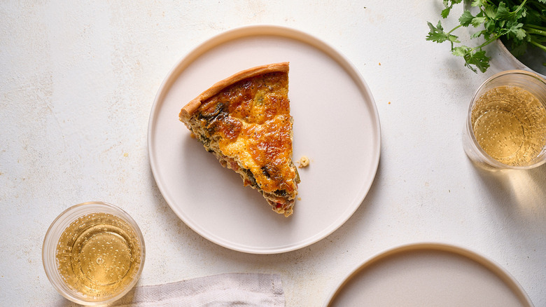 slice of quiche on plate