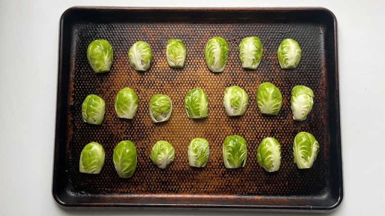 halved Brussels sprouts lined on a baking sheet