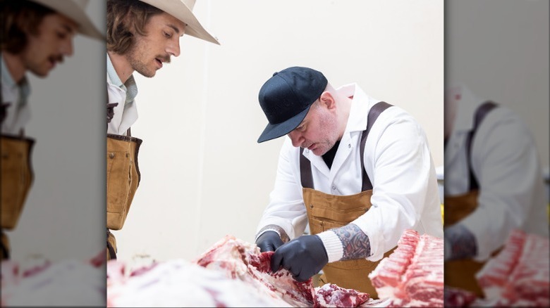 Chris Santos and rancher butcher beef