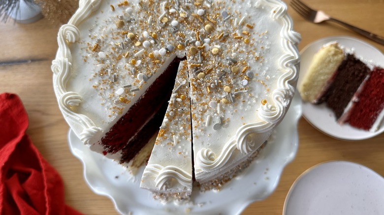 Neapolitan cake with slice cut