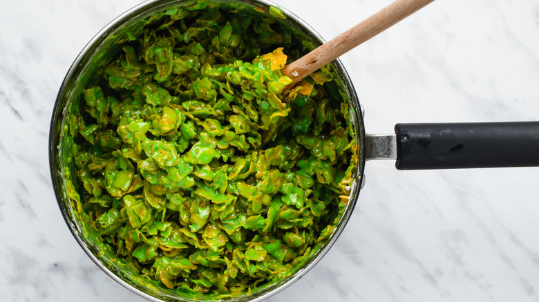 green cornflakes in a pan