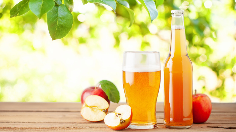 bottle and glass of hard cider