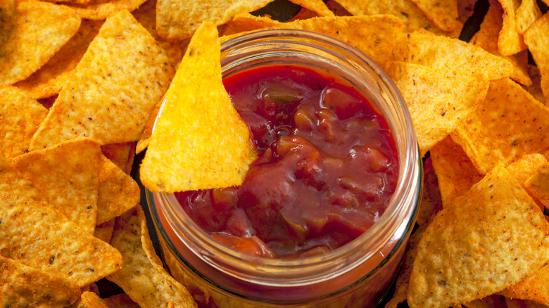 Jar of salsa with chips