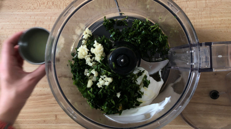 chopping ingredients in food processor 