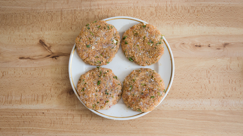 4 fish patties on plate 