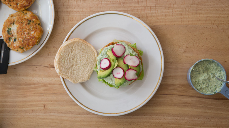 burger with toppings on plate