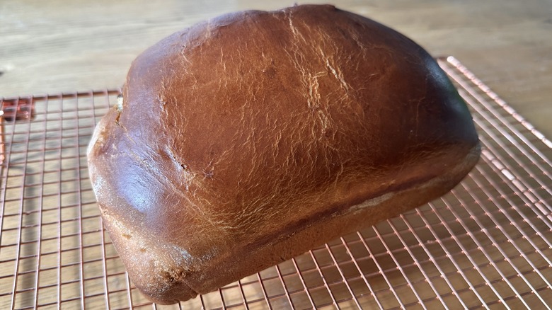 Cooling cinnamon-apple swirl bread on rack