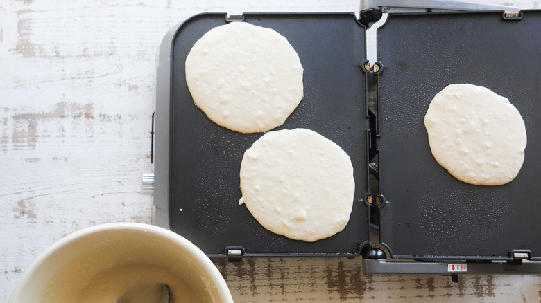 Pancake batter on nonstick griddle