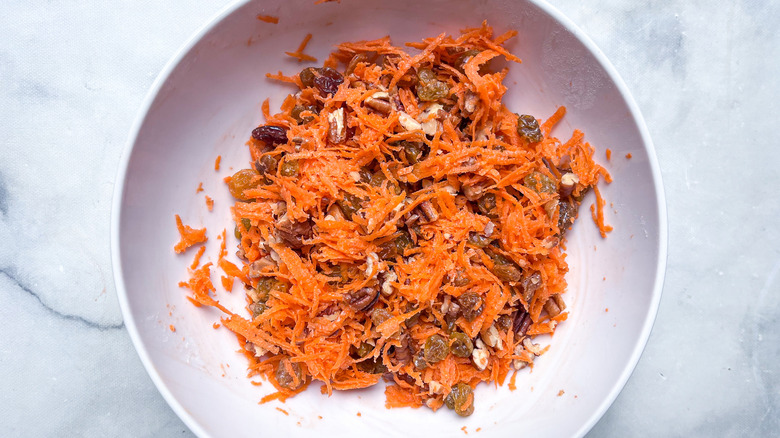 bowl of carrots pecans raisins