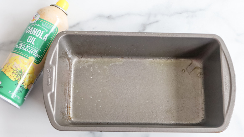 greased loaf pan with cooking spray