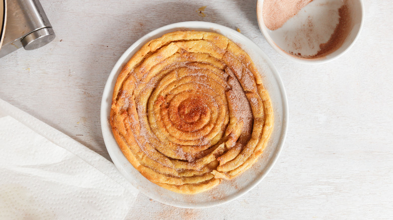 giant churro covered in cinnamon sugar