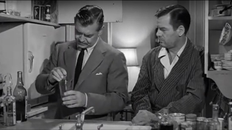 Clark Gable running the vermouth cork around a martini glass in "Teacher's Pet" (1958)