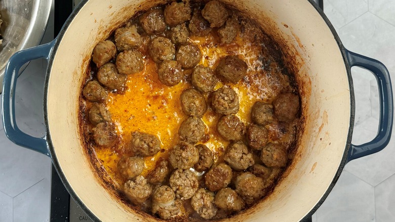 sausage chunks cooking in pot