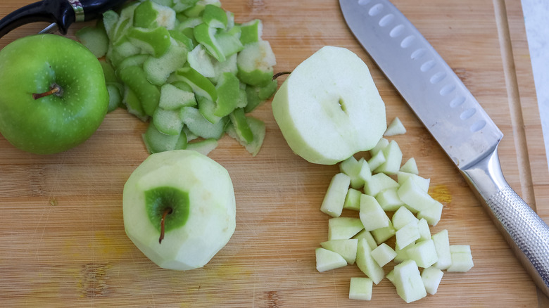 Apples chopped on a cutting board