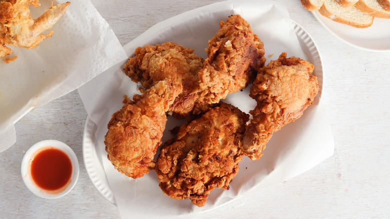 buttermilk fried chicken on white plate