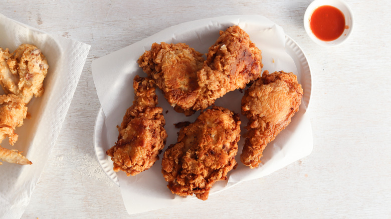 buttermilk fried chicken on white plate