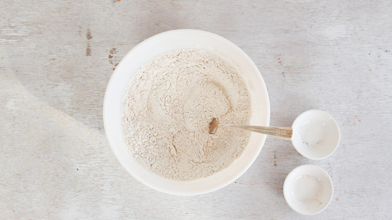 seasoned flour in white bowl