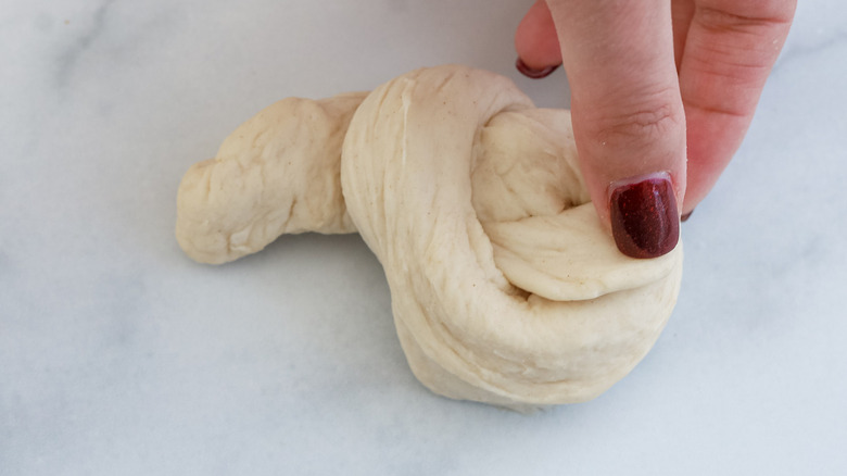 dough formed into knot