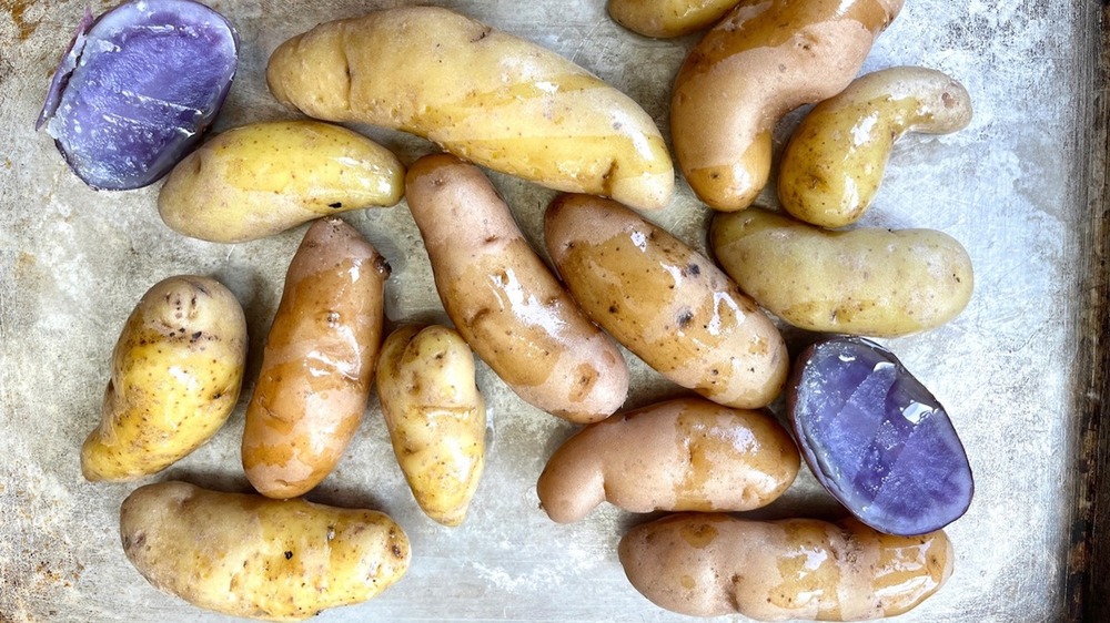 small potatoes on baking sheet