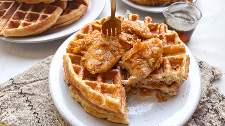 chicken and waffles with fork