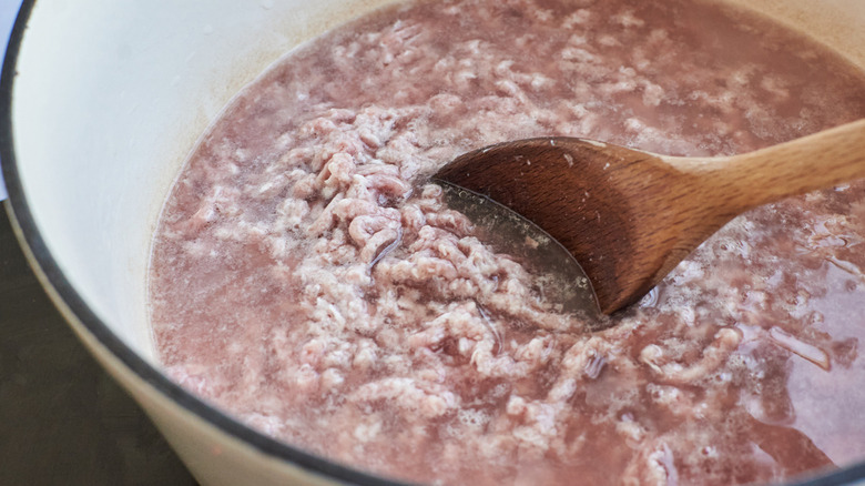 stirring beef in water