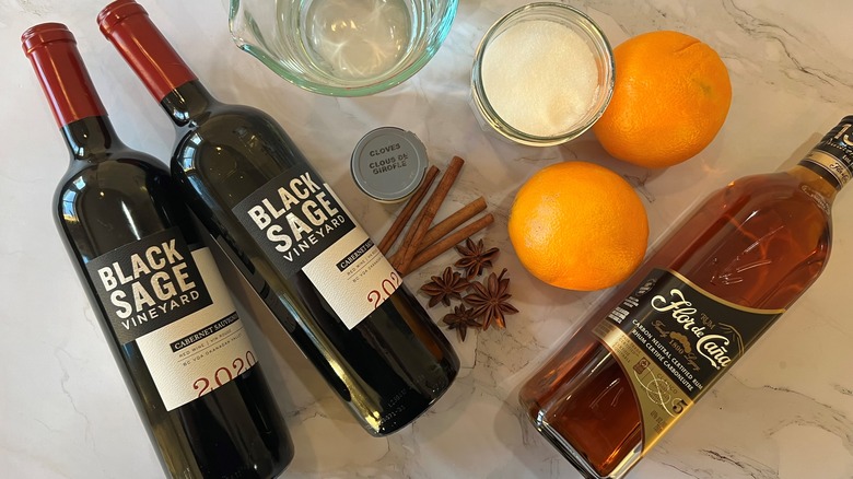 ingredients for mulled wine on marble counter