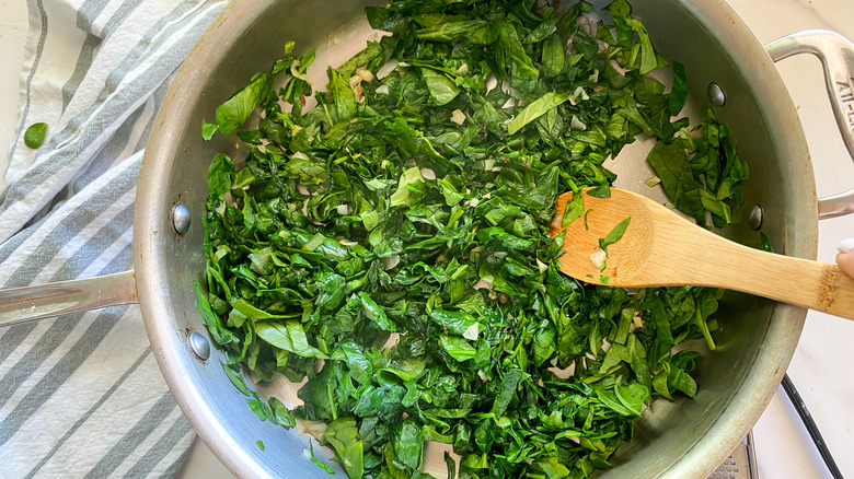 sauteed spinach frying in pan