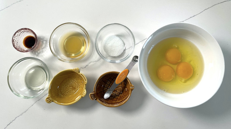 tamagoyaki ingredients in bowls on countertop