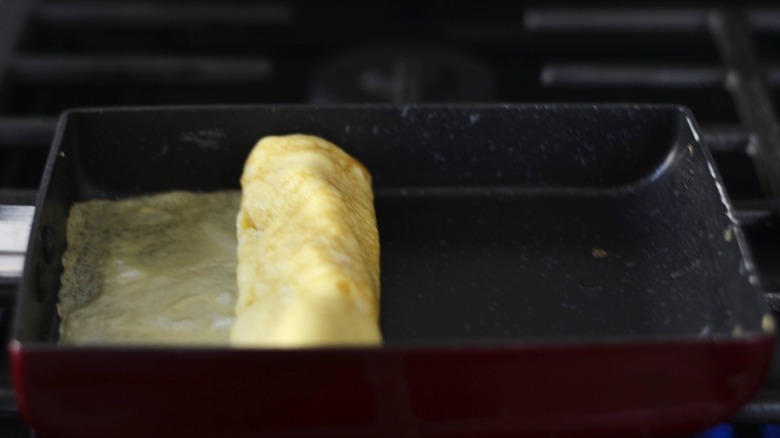 rolled egg mixture in square pan