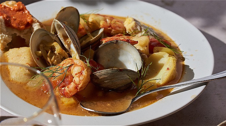 bowl of bouillabaisse being served