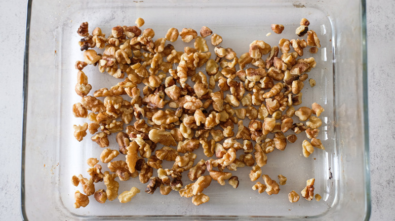 walnuts in glass baking dish