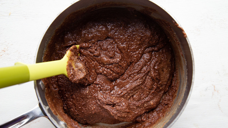 fudge in pan with spoon