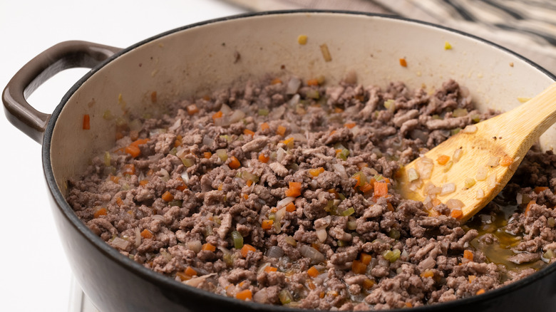 Ground mince and vegetables frying