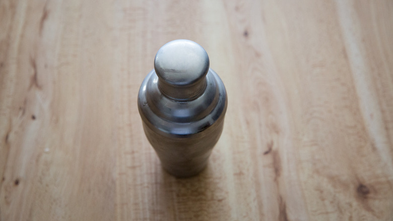 Closed cocktail shaker on table