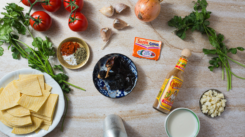 cjilaquiles rojos ingredients on counter