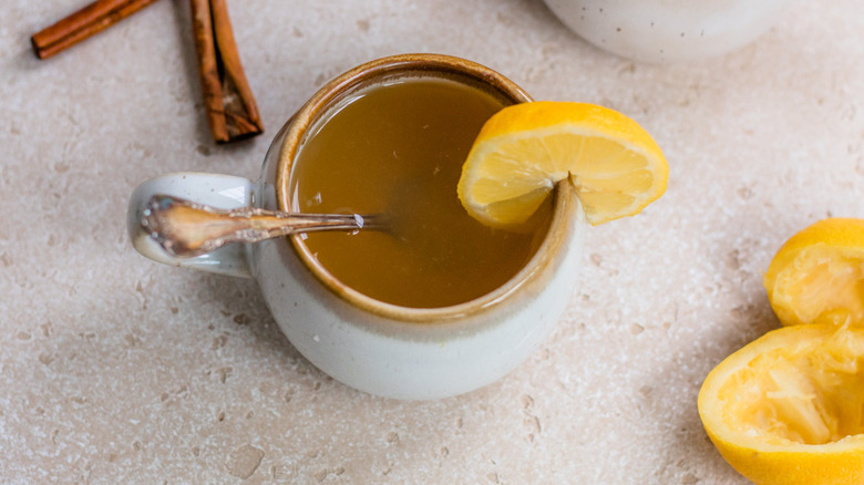 mug with cinnamon and lemon