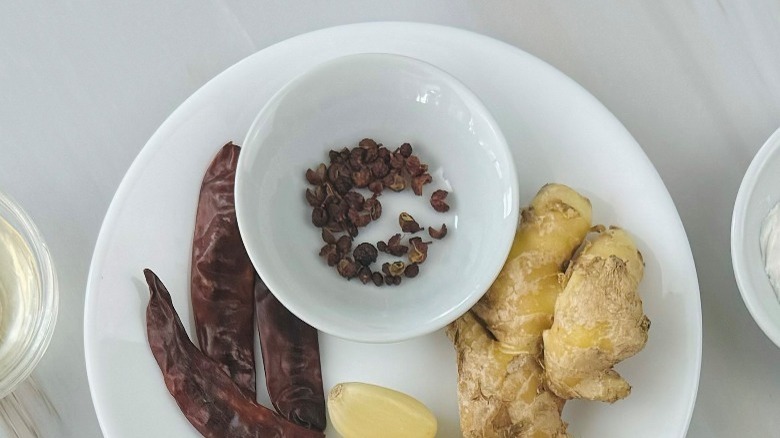 Sichuan peppercorns in white bowl