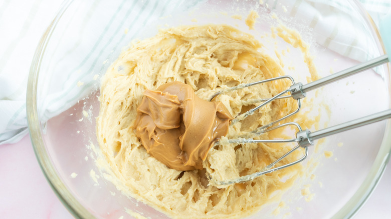 mixing peanut butter into dough