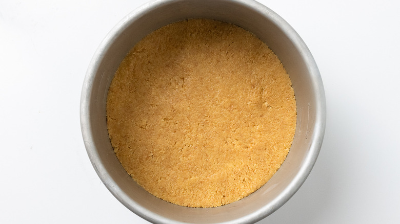 cheesecake crust in cake tin