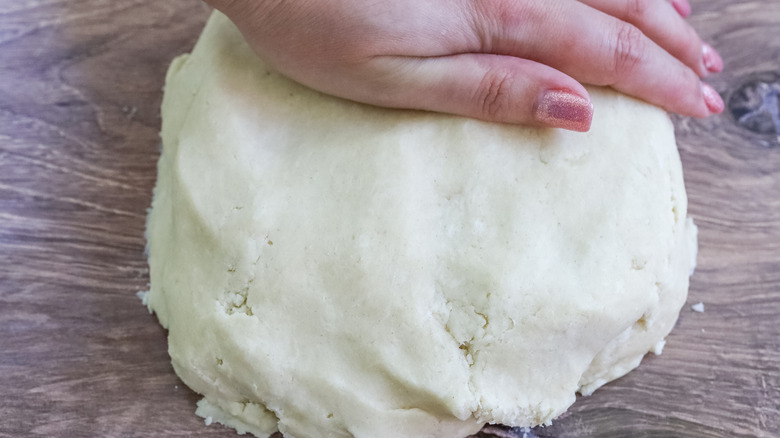 making dough ball on counter