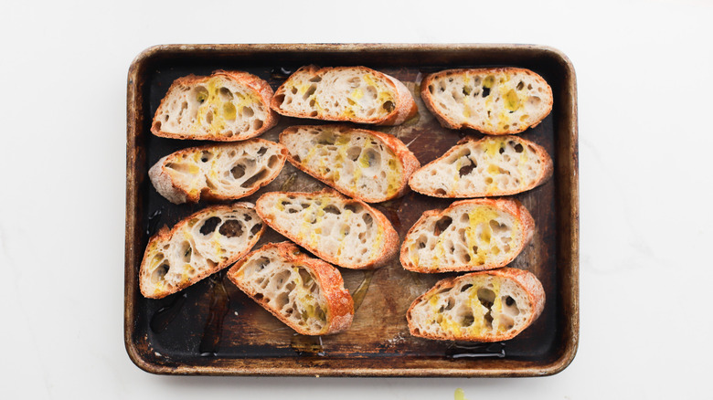 Tray of unbaked crostini