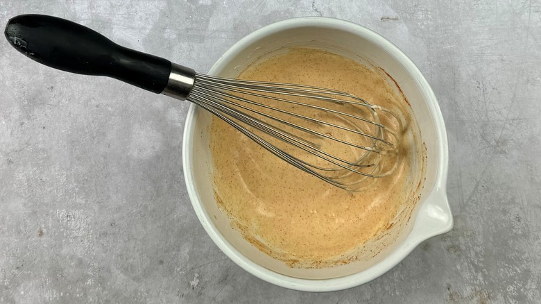 mayonnaise dressing with whisk