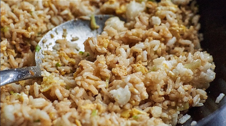 close up of rice in wok