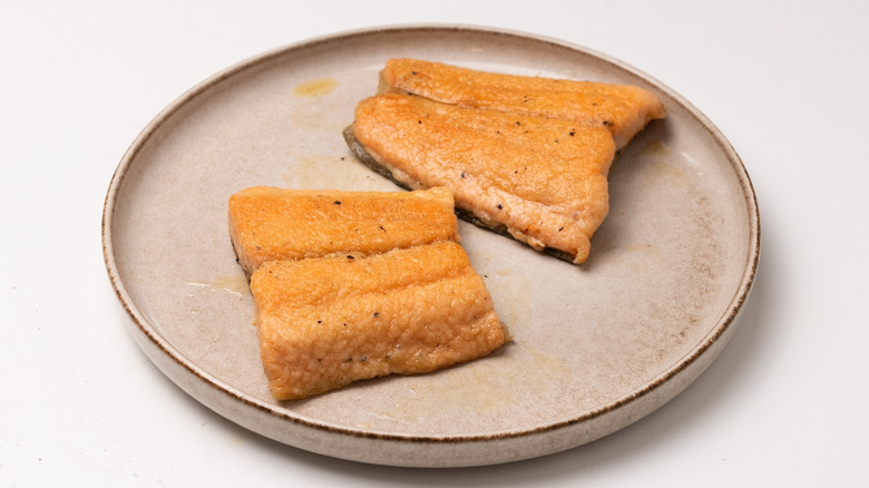 fried trout on a plate