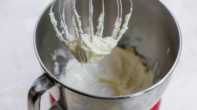 vanilla frosting in mixer bowl