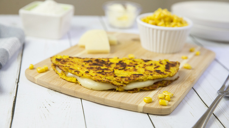 cachapa served on wooden board