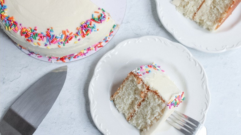 sliced white cake with rainbow sprinkles