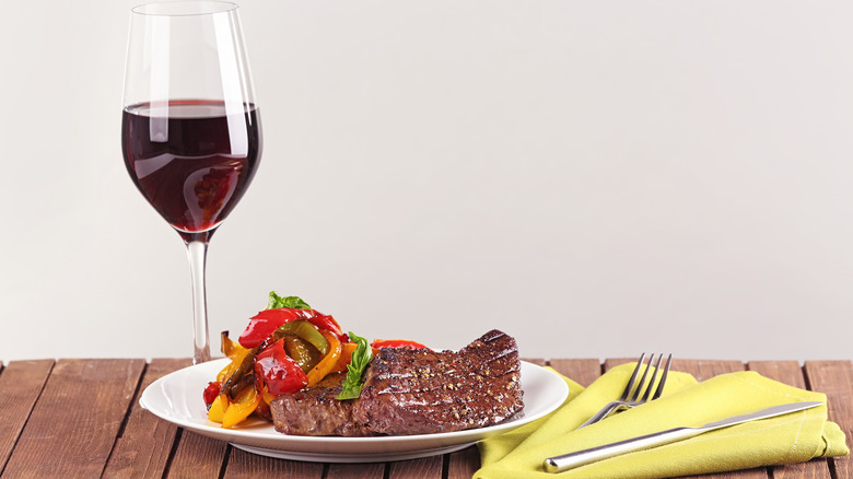 steak and glass of red wine